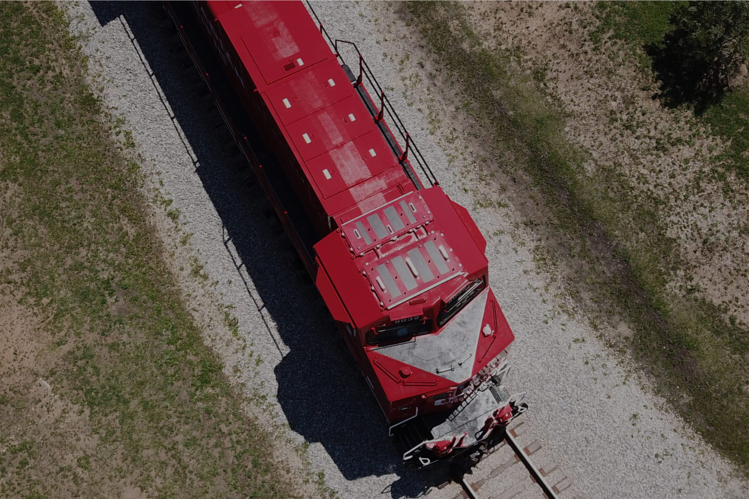 red locomotive shot from above